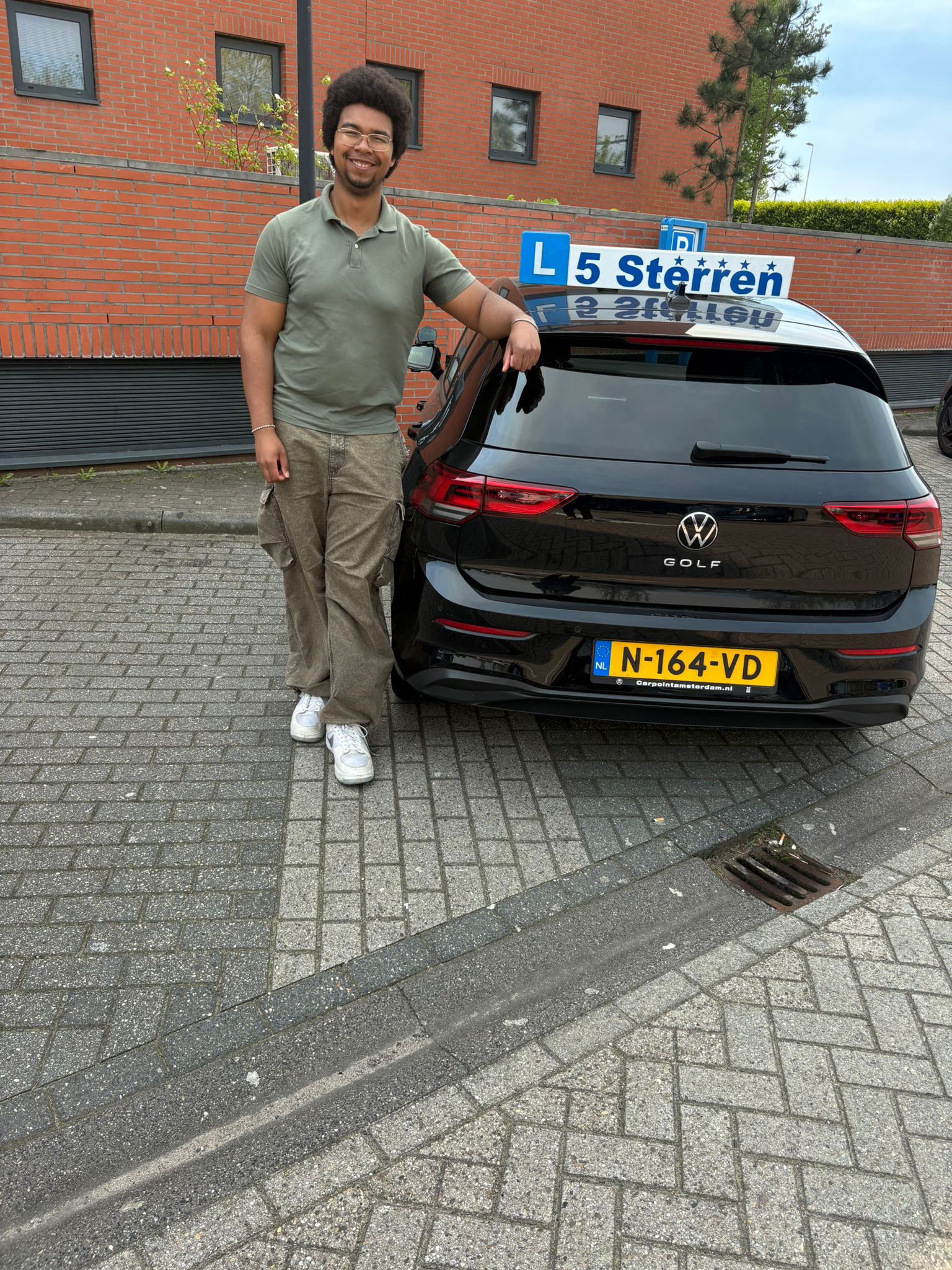 Geslaagde leerling bij rijschool in Amsterdam
